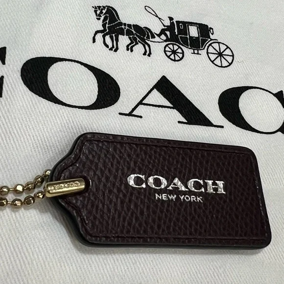 Coach New York Pebbled Leather Bag Tag in mapla with Gold Chain - Picture 2 of 9